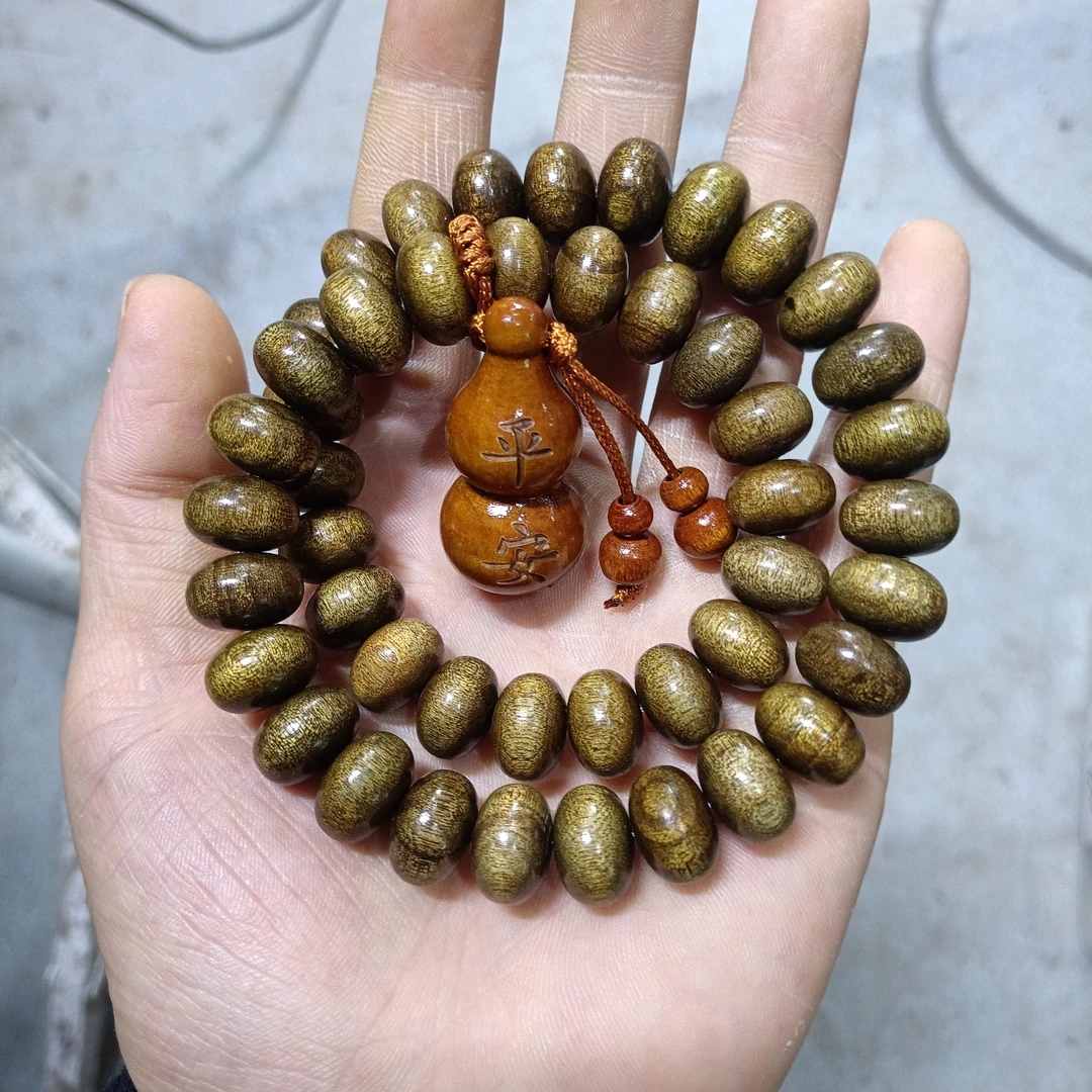 H234 金丝楠算盘1.3cm手串