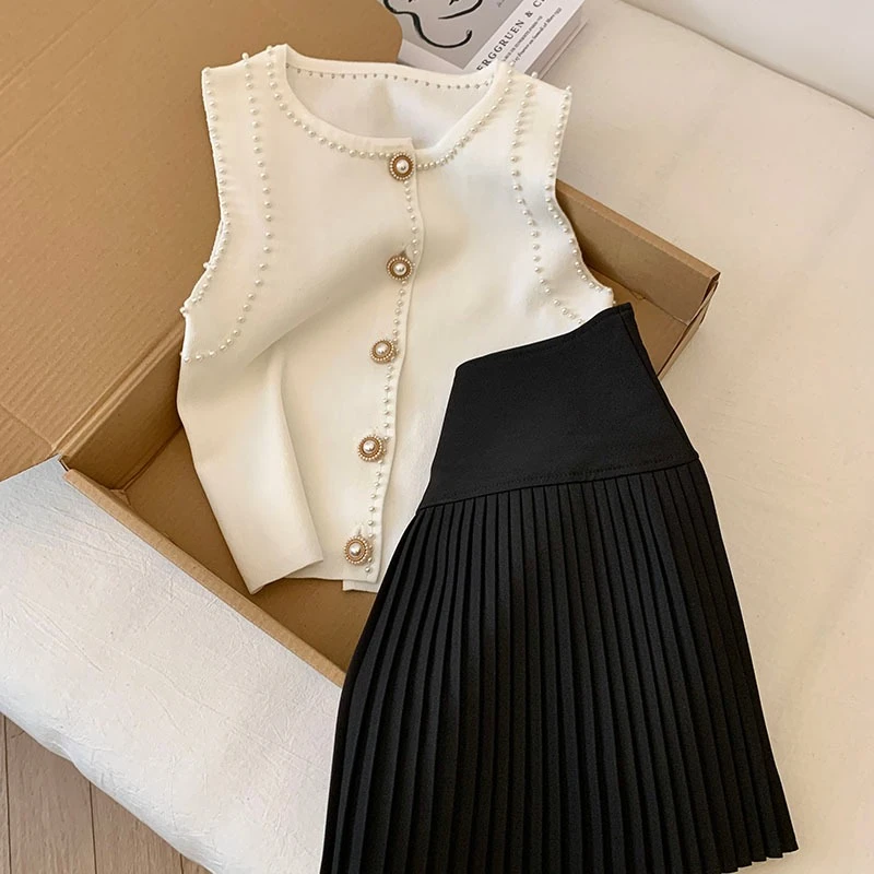 专柜撤回剪标重工钉珠无袖针织背心女夏新款高腰百褶裙叠穿两件套