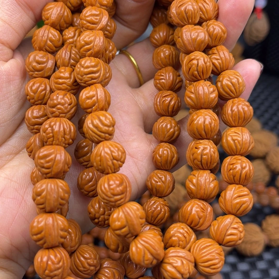 向***生手串桃核小金蟾脖挂