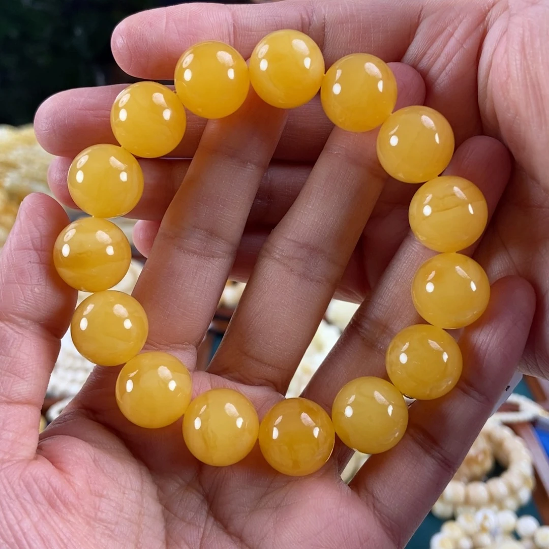 琥珀未镶嵌珠宝奇石15同料鸡油红圆珠30.26