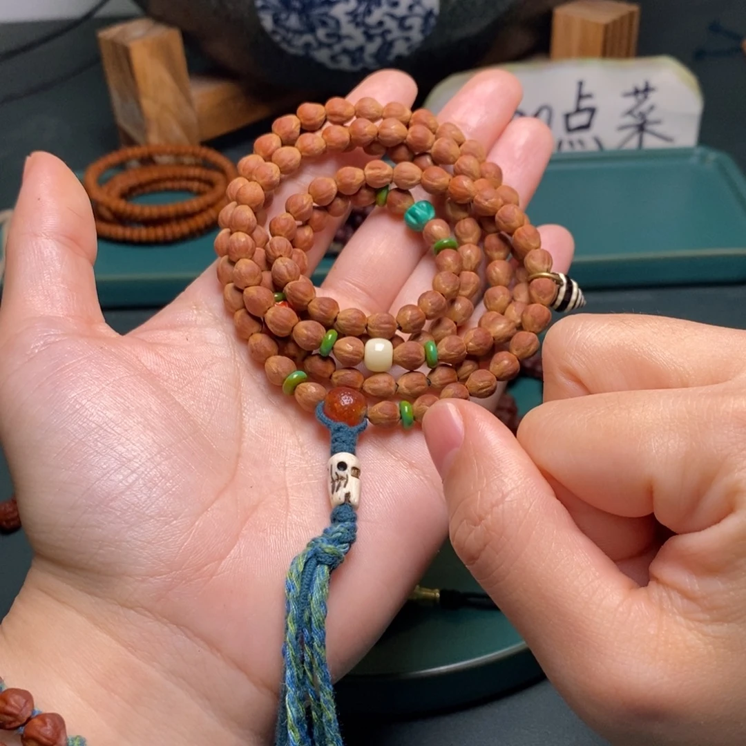 柏香籽/百香籽手串499.9水滴莲花