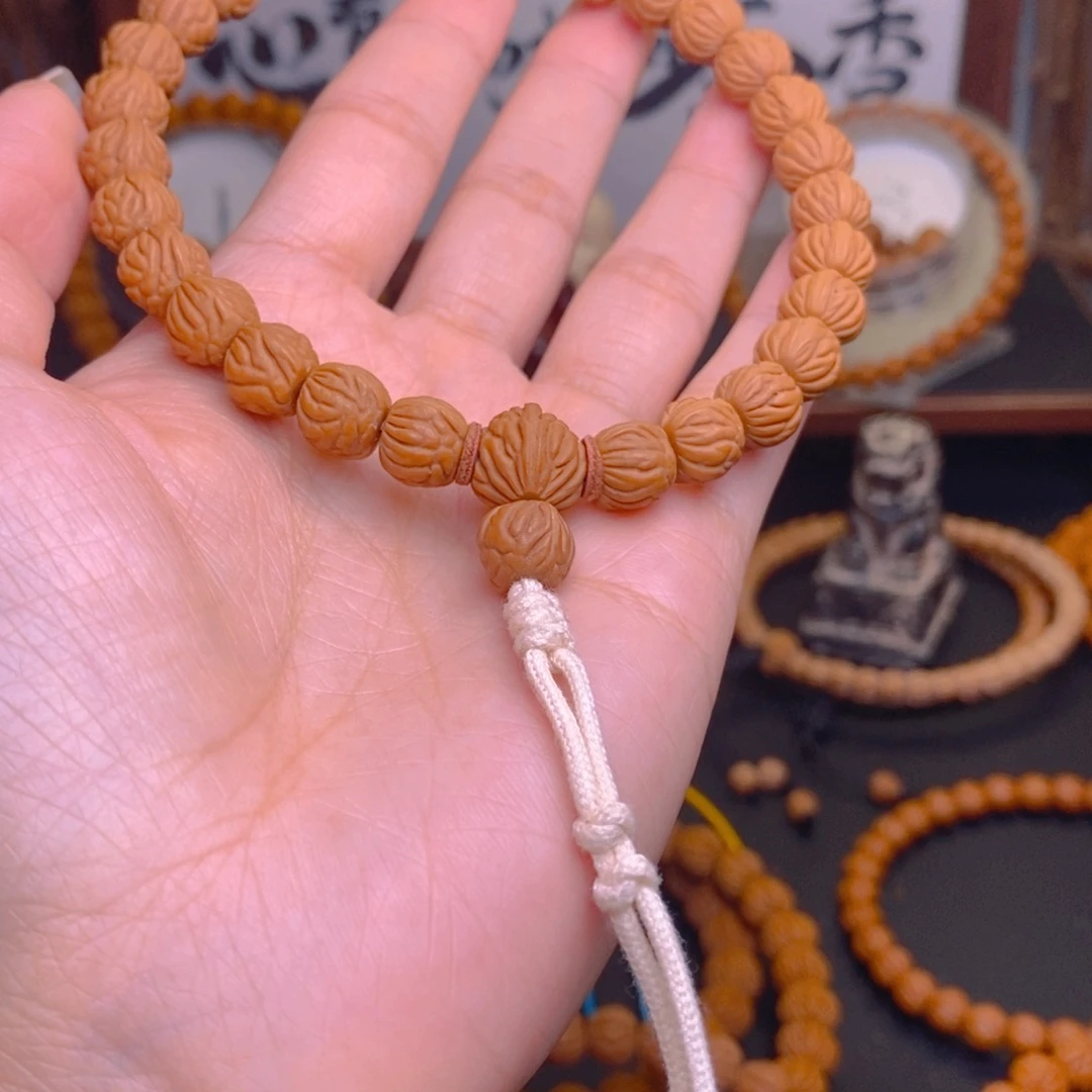 宇***同桃核手串龙文桃核