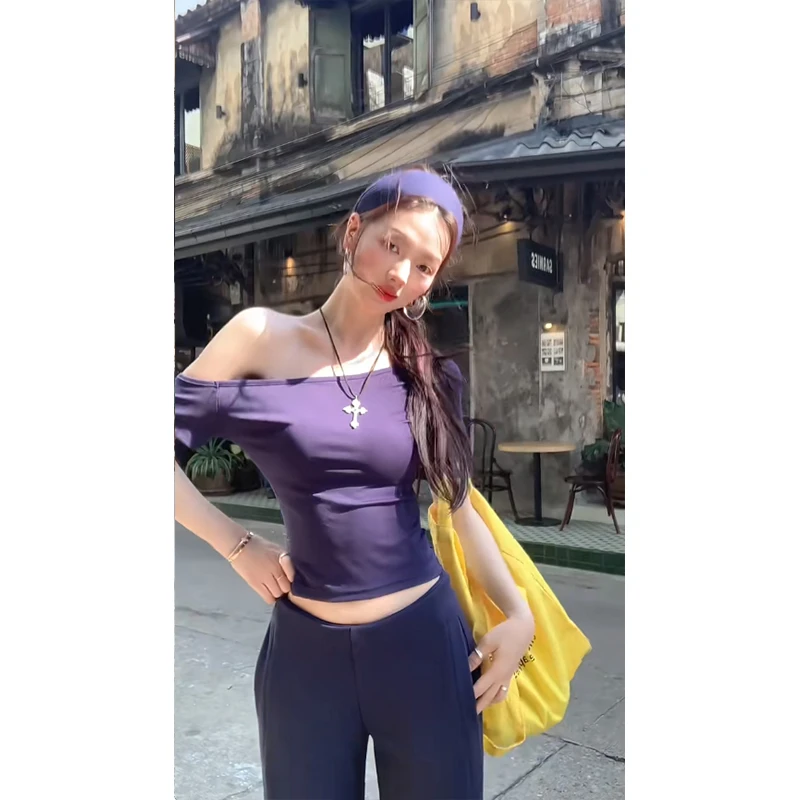 2025秋季新款露肩设计感性感纯欲辣妹短款一字肩上衣高腰微喇裤子