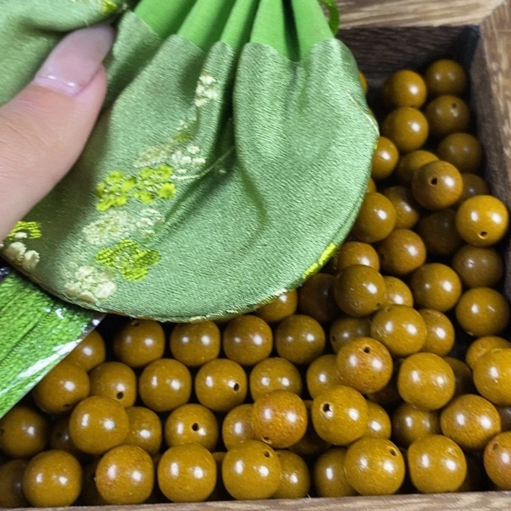 1.0木樨桂花瑕疵珠约90g打底120颗