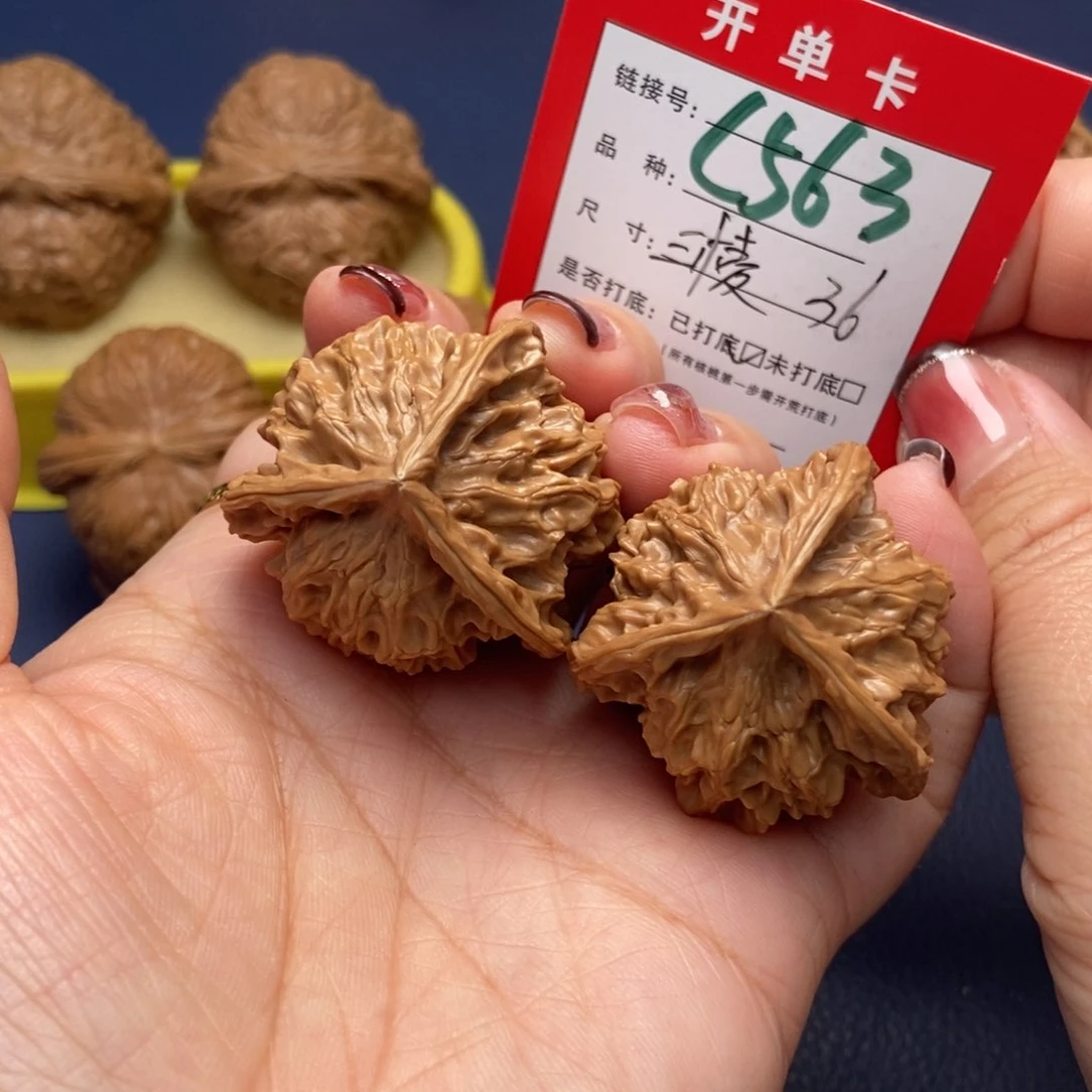 桃核吊坠喀****拍文玩核桃