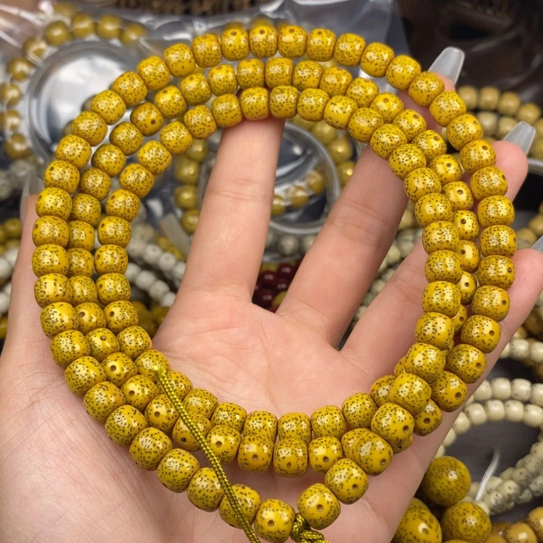 星月菩提吊坠老*长7x8鸡油黄108