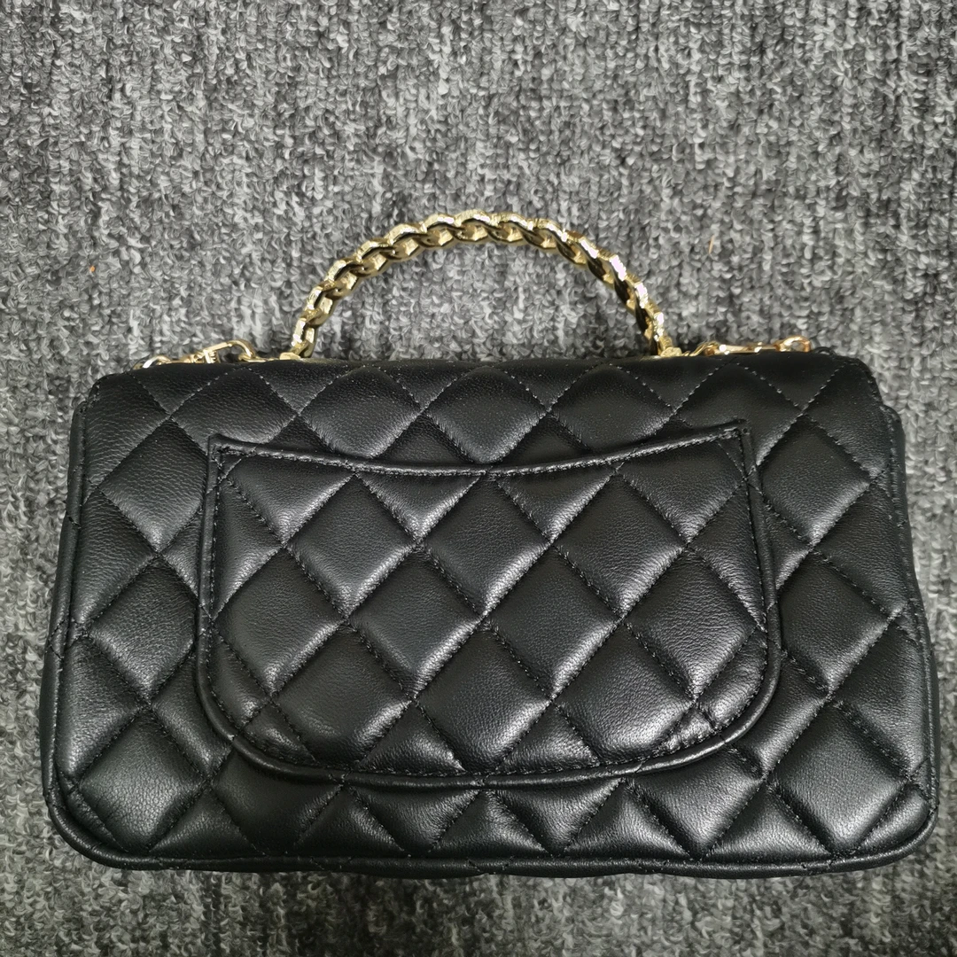 姝宴真皮女包扁手提黑色