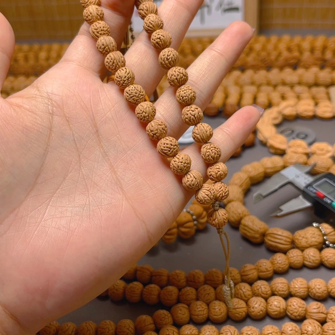 蚌***男吊坠桃核桃核手持