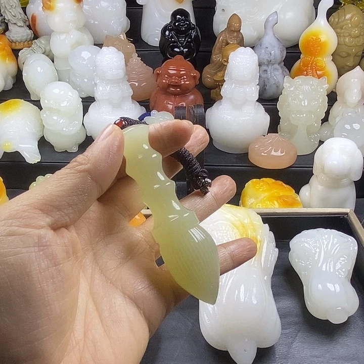 无花朵原石手把件