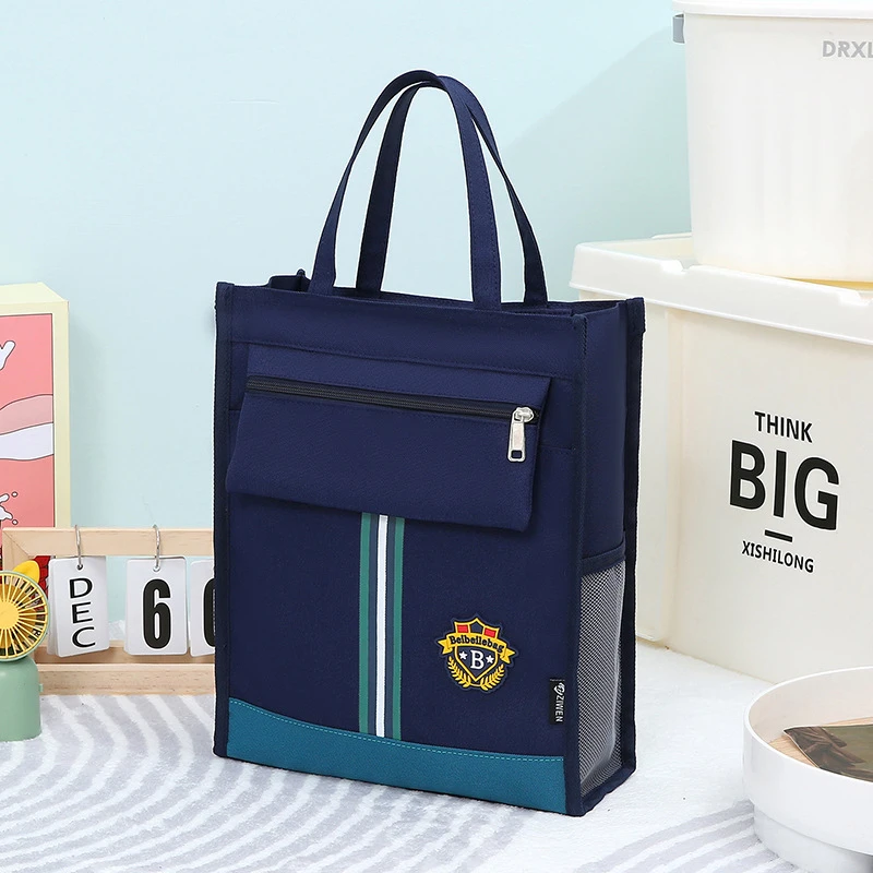 新款小学生书袋男女孩补习袋儿童防水轻便手提袋大容量文件袋AVV