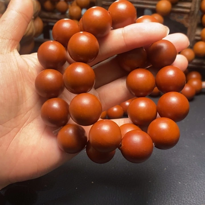 不***人手串橄榄核1.85尺寸树王鸡血红光珠2串