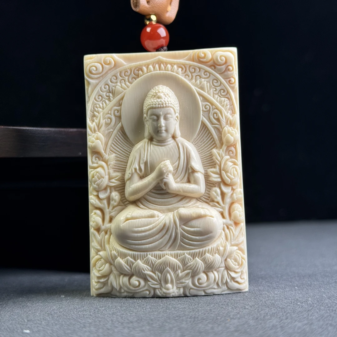 K9306天然猛犸牙 雕刻阿弥陀佛 42*65*23mm支持鉴定 假一罚四