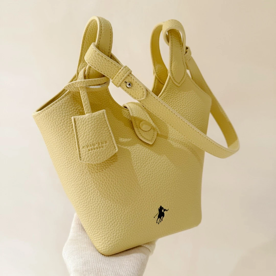 南风Chio2nd 鹅黄色水桶包包女2025超火春夏手提斜挎小包