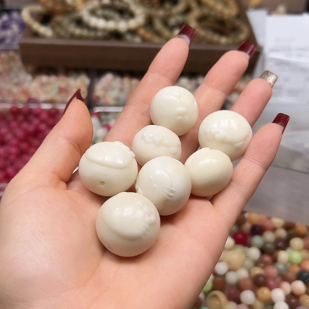 手串菩提根/象牙果瑕疵白Kt蛋7颗有裂