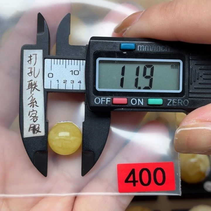 H***a蜜蜡未镶嵌裸石微瑕