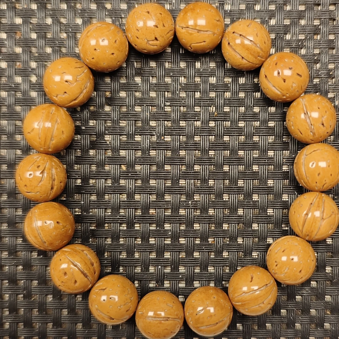 13尺寸精品野生黄皮桃核光珠手串