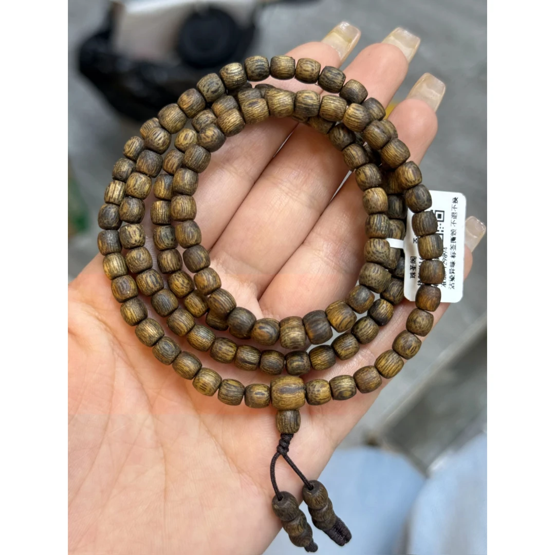 沉香【青霞沉香】5A尖峰岭白棋虫漏0.5直丝鼓珠多圈 多样性发一条