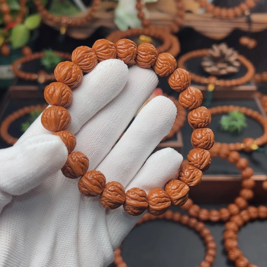 吊坠桃核交****啡1.4双脊龙手串