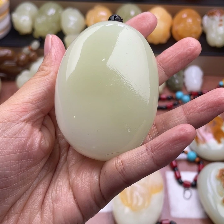 燕***子石材古青石手把件