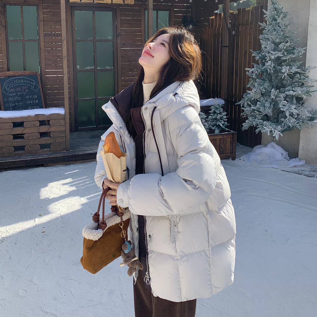 米白色高级极简泡芙羽绒服女2025冬季新款保暖连帽加厚面包服外套
