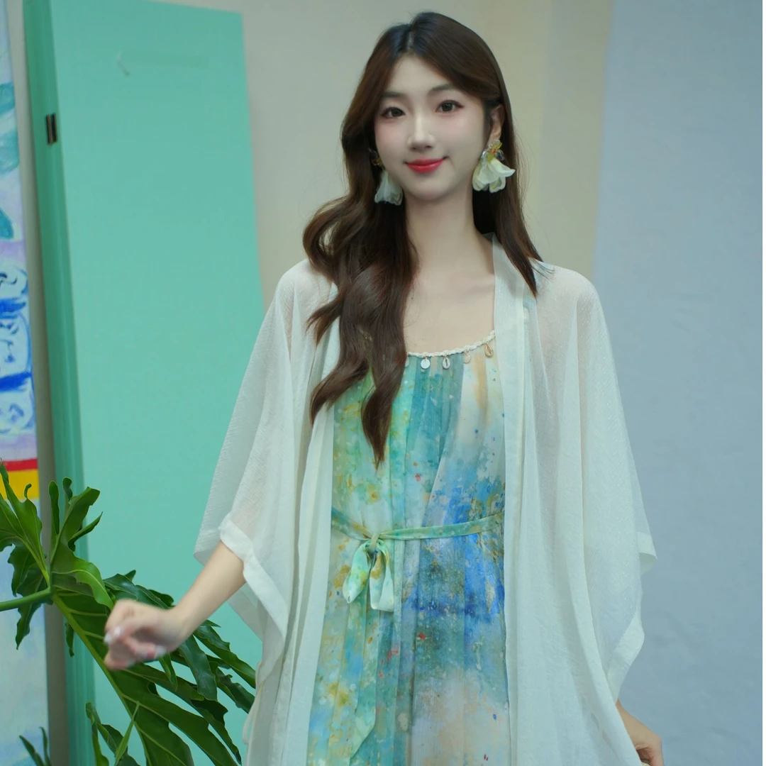 两三事鎏金絮语夏季新款莫奈系列百搭文艺浪漫温柔印花吊带连衣裙