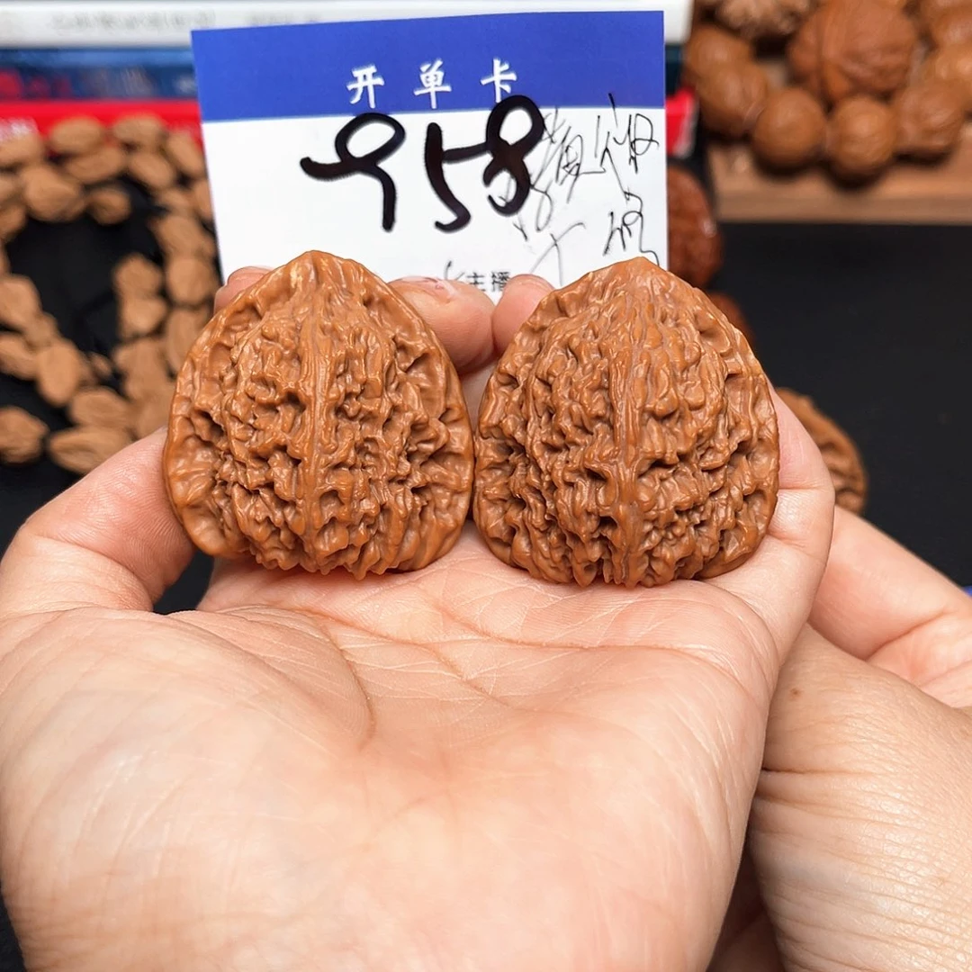橙***丶吊坠桃核三角疆40尺。