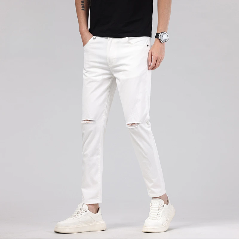 男士春季白色破洞牛仔裤男修身白裤子九分裤一字洞九分牛仔裤