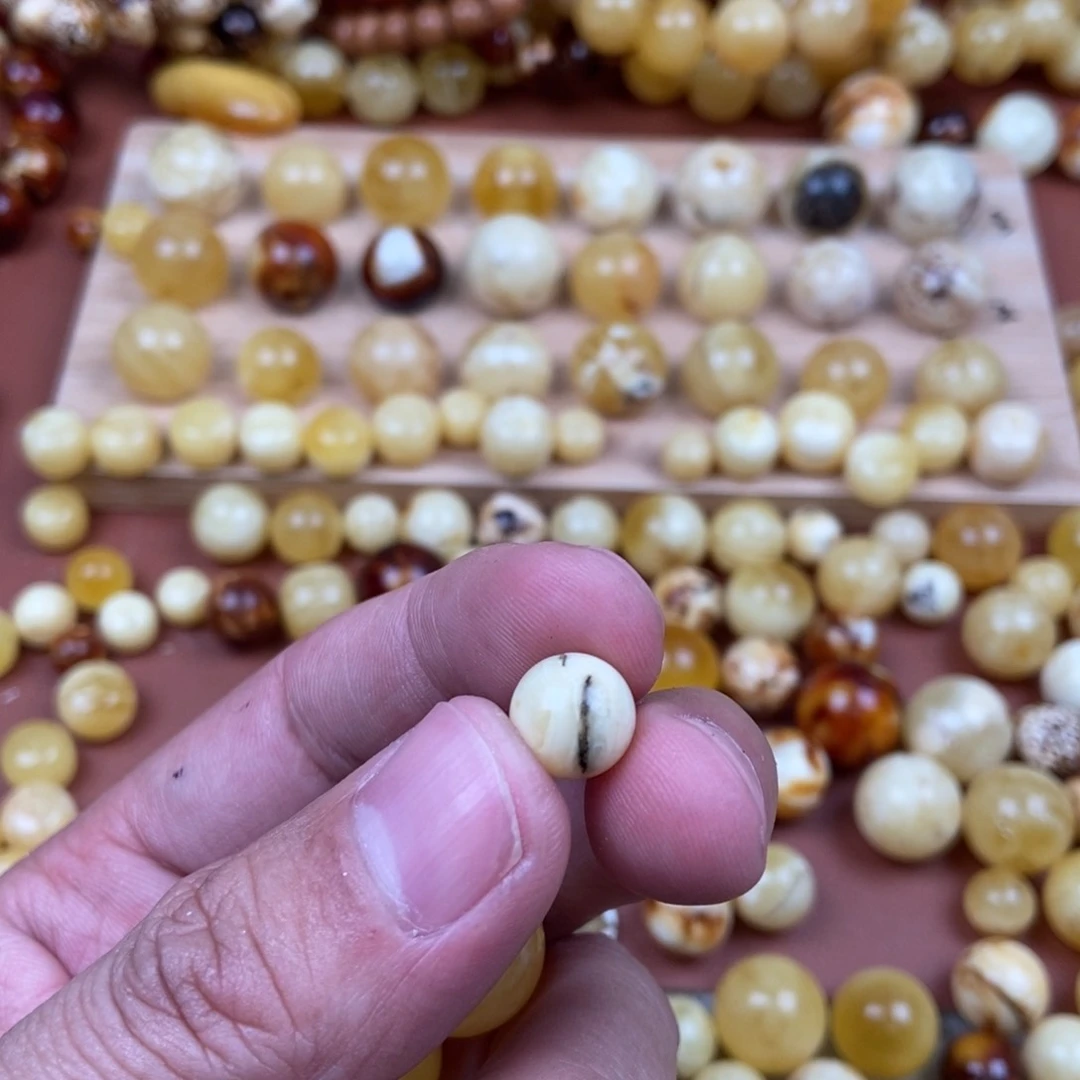 蜜蜡裸石未镶嵌骑****行蜜蜡