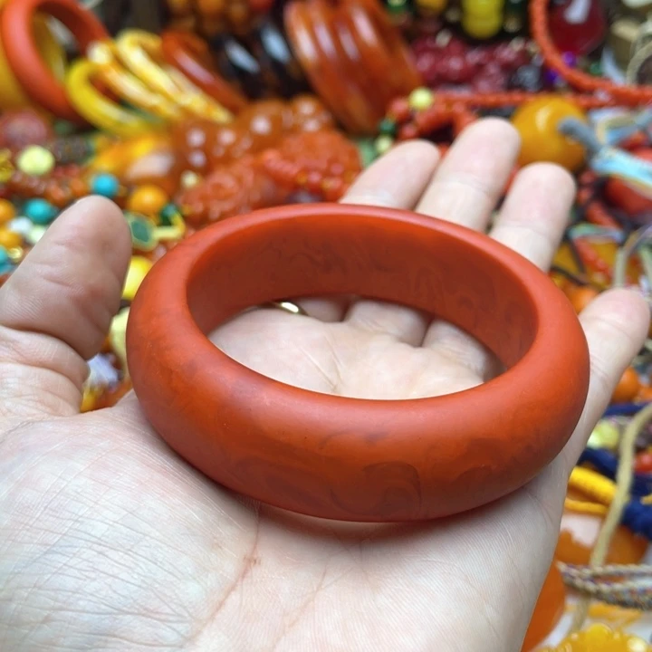 树脂制品菲*，39号橘红色手镯