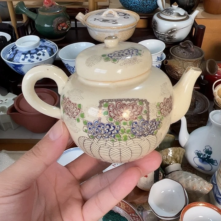 …****瓷片后手壶一个好看的哦