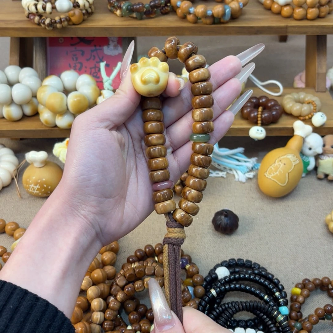 秦***呀库克吊坠库克手持