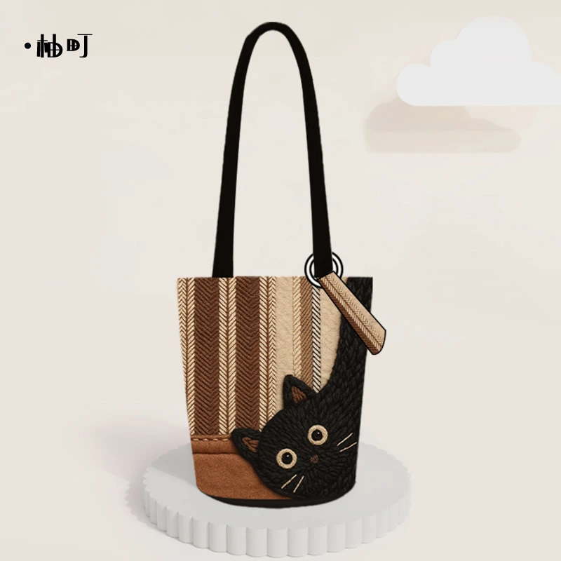 柚町午后小憩潮流猫咪印花手提单肩可斜挎长水桶女士帆布包包