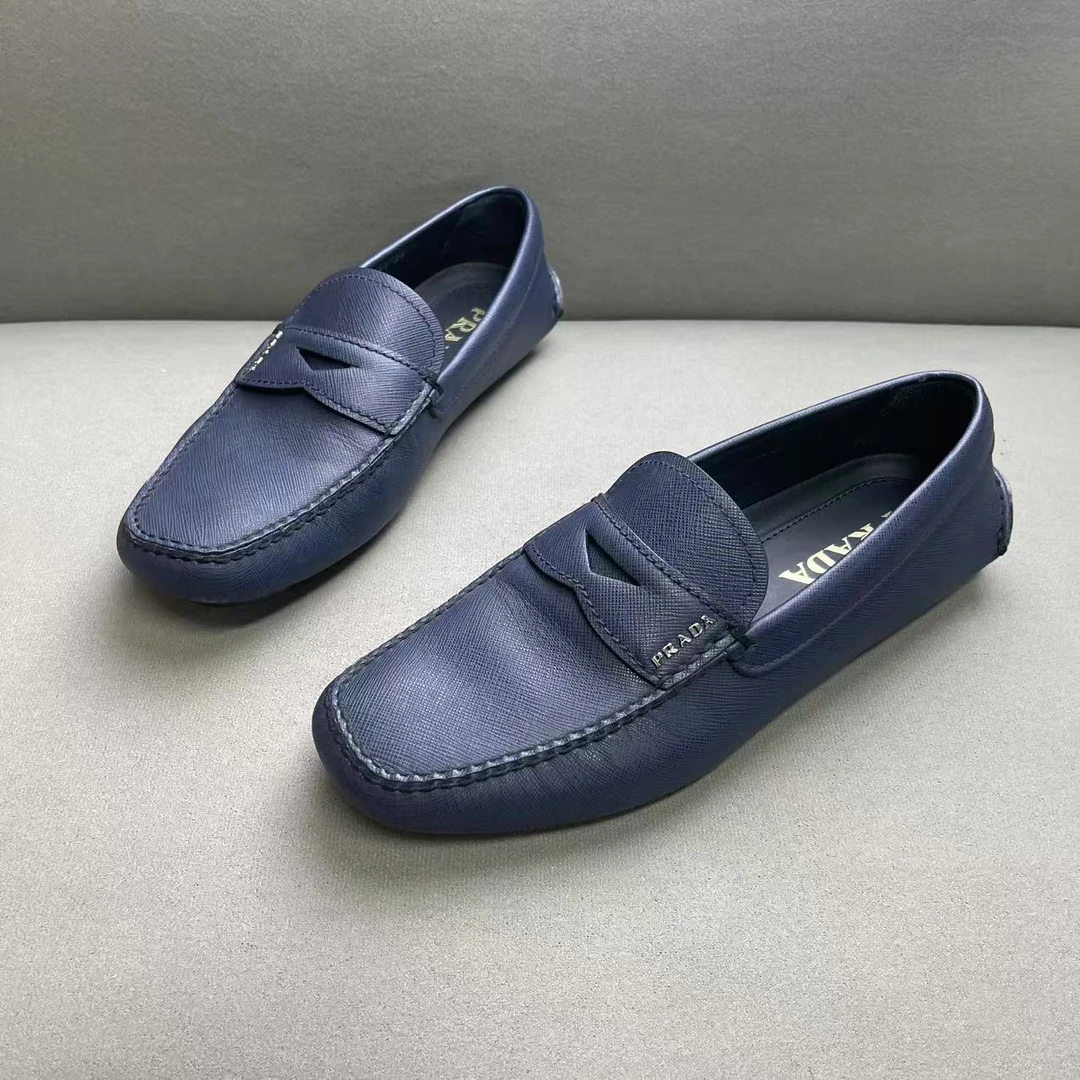 99新 Prada/普拉达 蓝色时尚舒适镂空倒三角银标豆豆鞋 39.5码