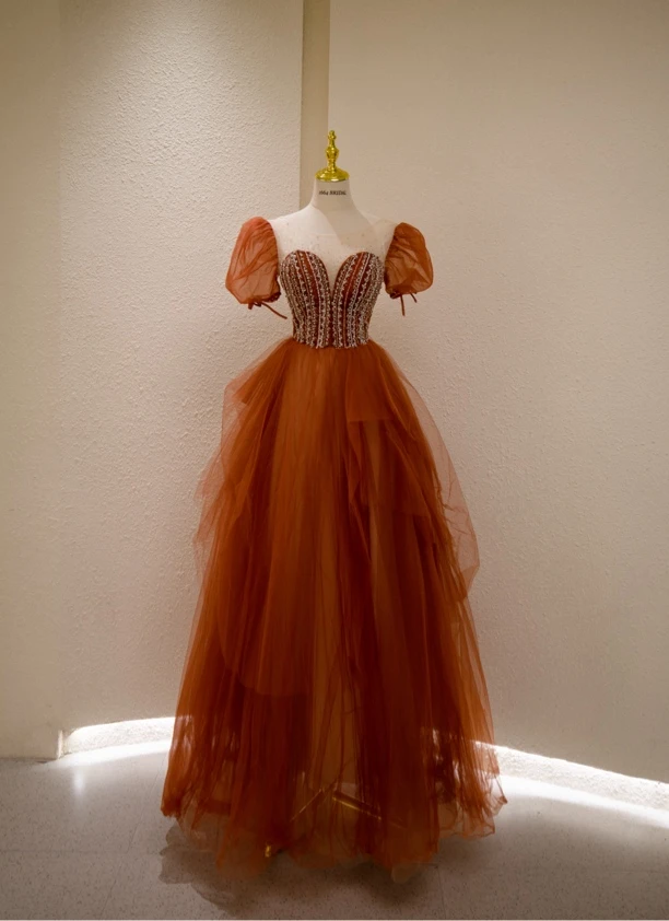 橘色泡泡袖礼服婚纱店样衣