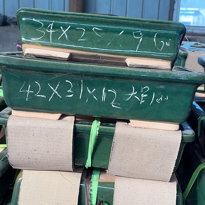 紫砂花盆150-4。  2大2小