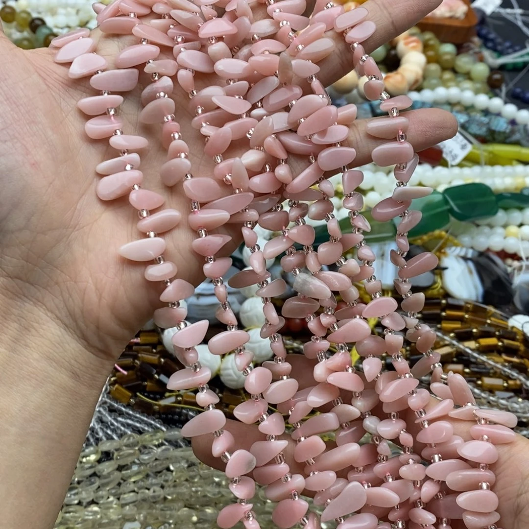 未镶嵌玛瑙/玉髓珠宝半成品一条纯天然粉澳宝尖牙