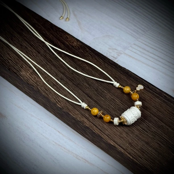 H22-08天然猛犸牙 祥云吊坠约11*14mm支持鉴定假一罚十