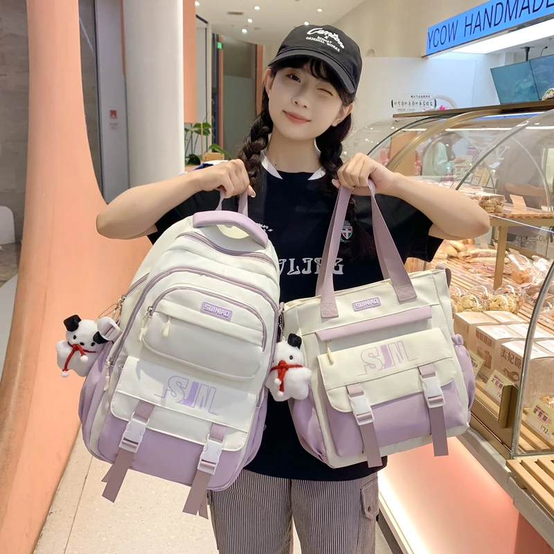 书包女生初中生新款高颜值中学生大容量背包小学生轻便减负双肩包