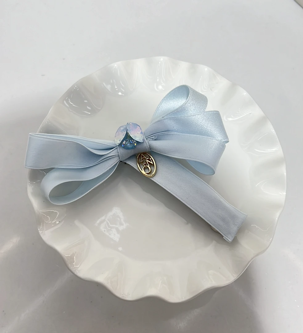 228-15蓝色蝴蝶结弹簧夹