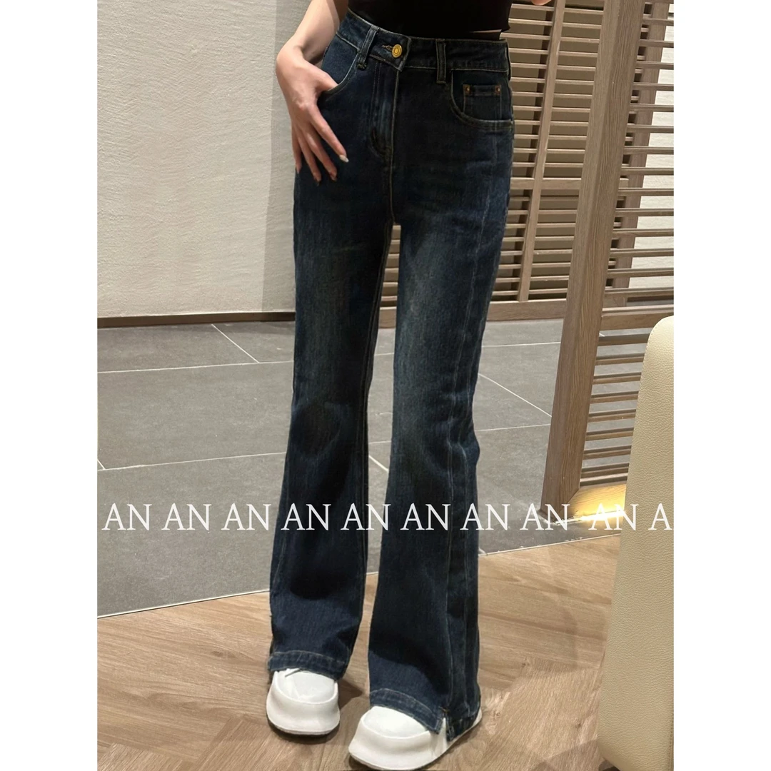 C09311秋季潮流时尚显瘦小个子百搭裤脚开叉高腰牛仔微喇裤