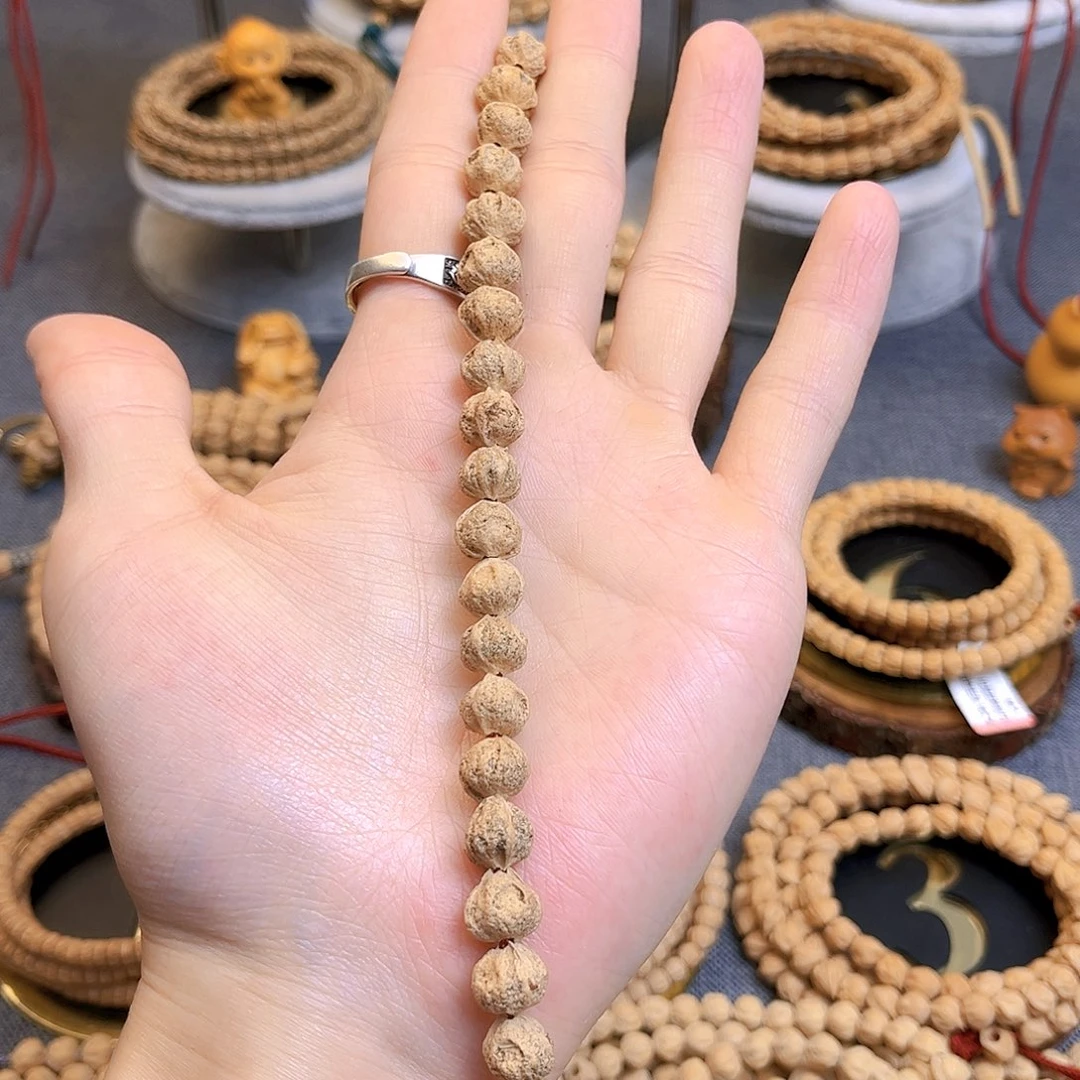 桑***o柏香籽/百香籽吊坠