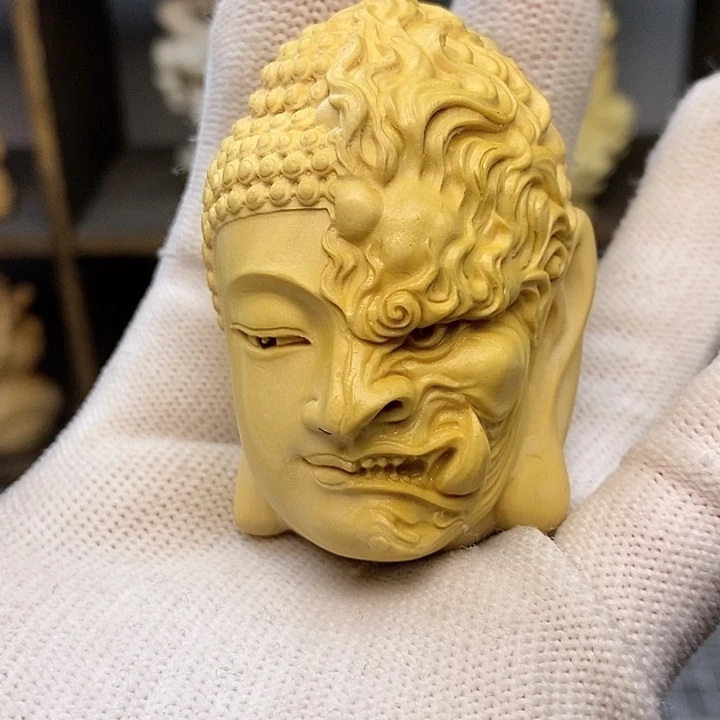 木一念之间黄杨木6公分手把件