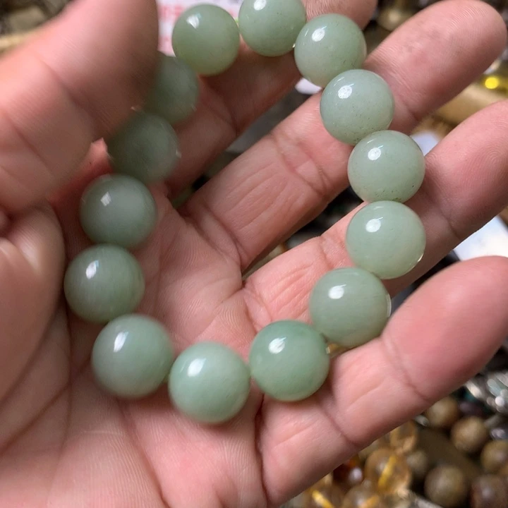 爱***人一物一拍翠翠手环