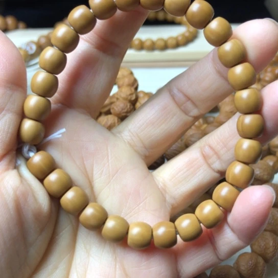 橙***熙猴头核桃手串直切