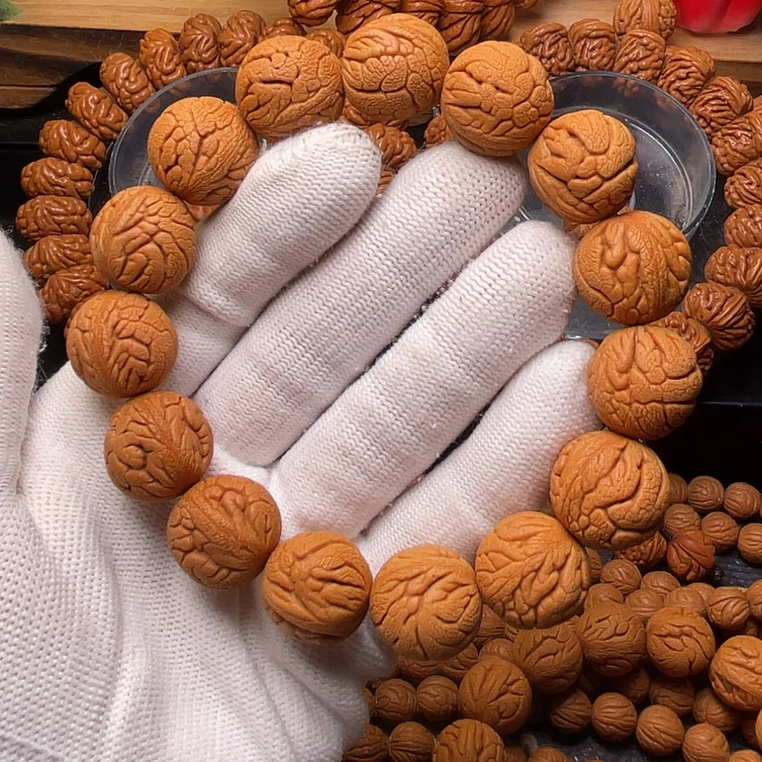 手串桃核金丝龙珠1.7