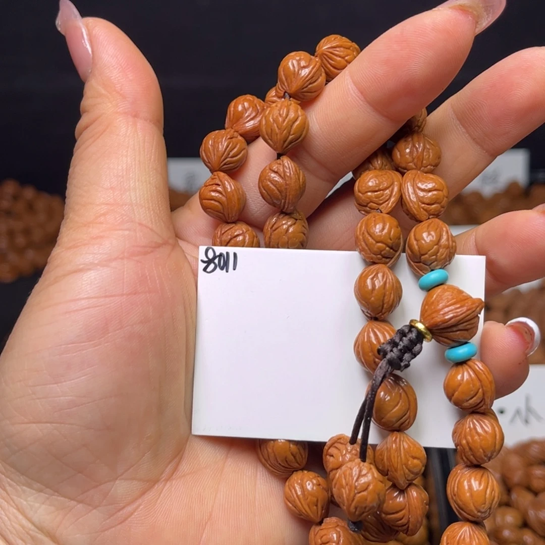 桃核手串小龙纹10左右46手持成品