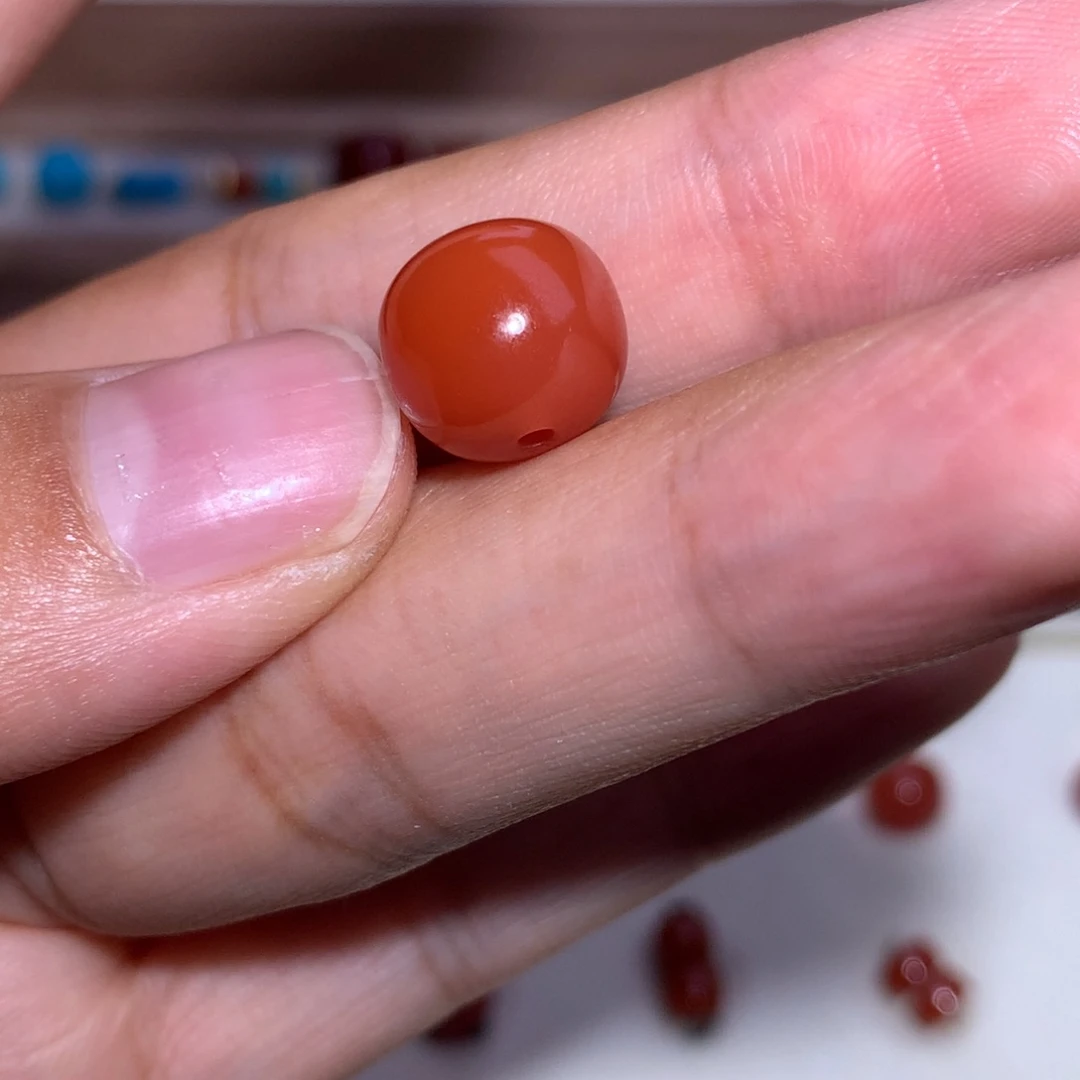 陈***琦南红玛瑙未镶嵌柿子红微纹漏价10.6×9.6
