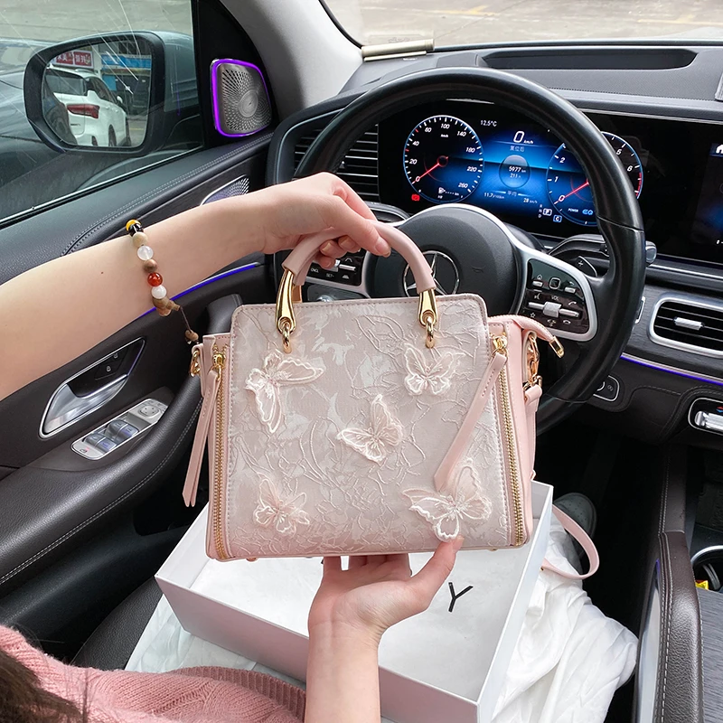 SKTSTY小众蝴蝶粉色托特包包女款爆款2025新款潮大容量手提包斜挎