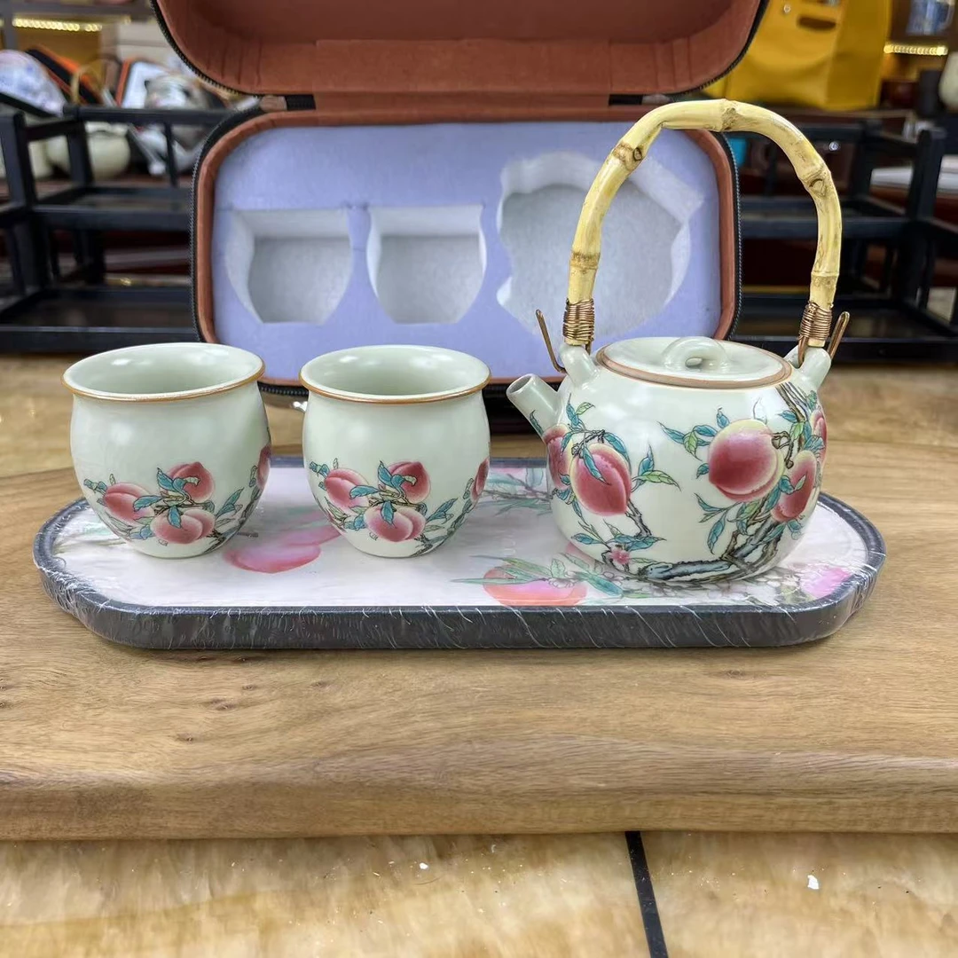 九桃1提壶2圆肚杯加九桃盘加棕色皮包1392