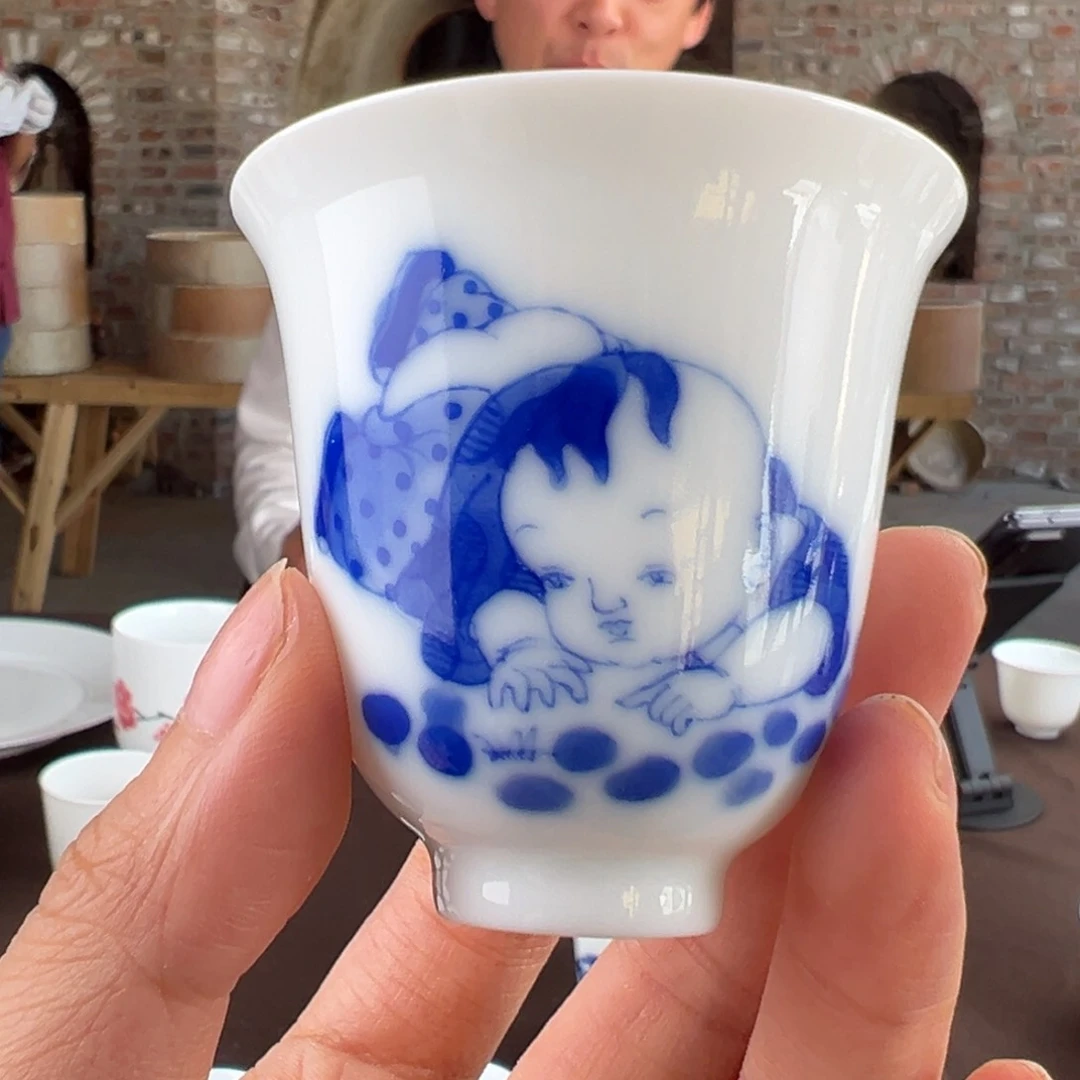 柴窑素胎童子铃铛杯